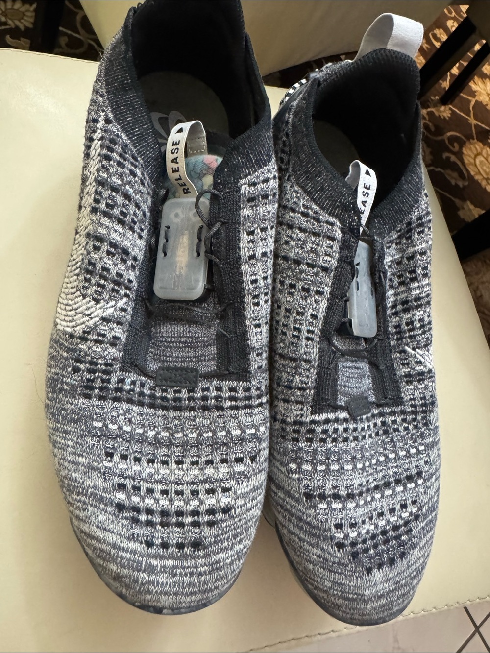 Nike Men’s Knit Slip-On Sneakers in Black and Gray